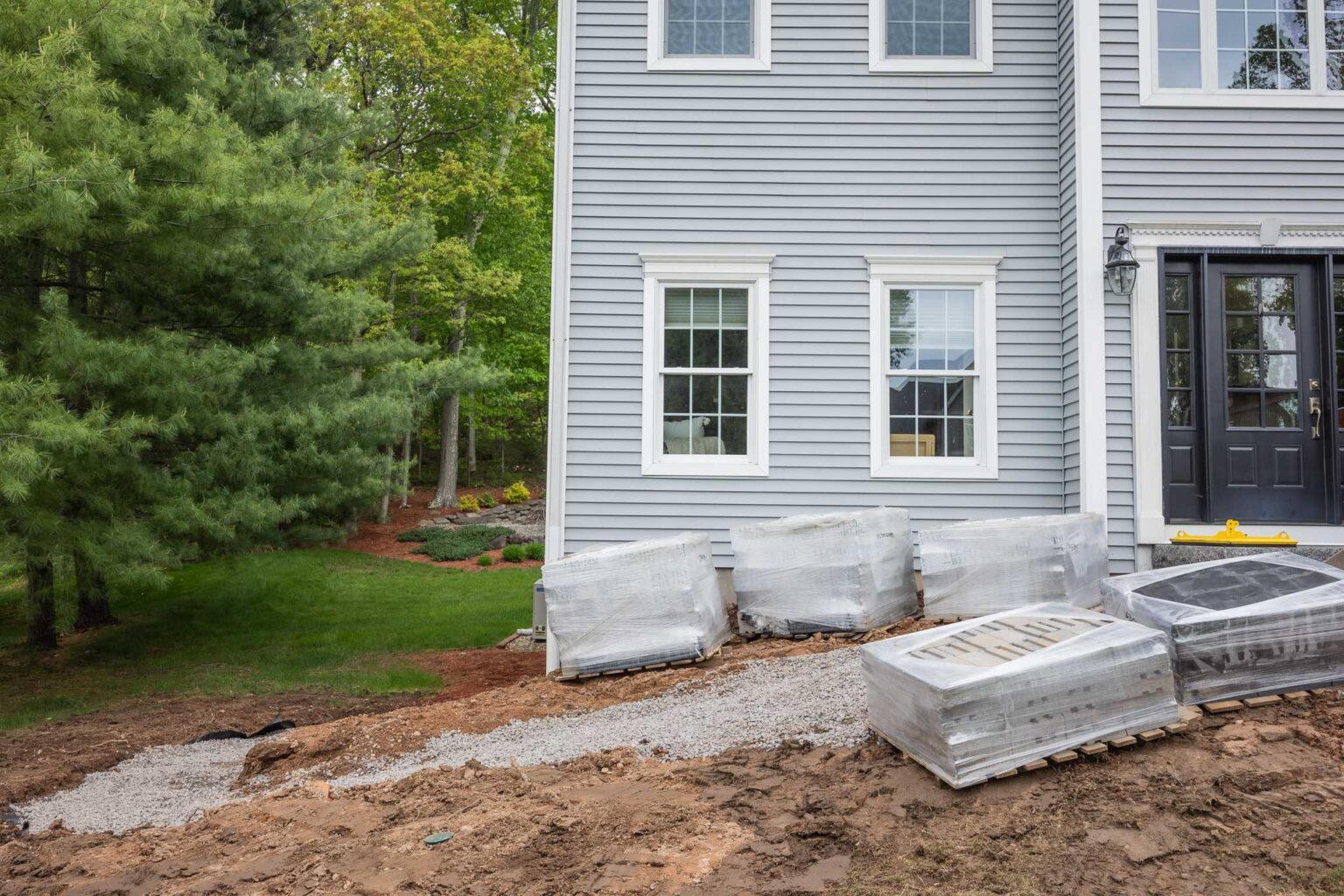 Before photograph of retaining wall being built by Bahler Brothers in Manchester, Connecticut