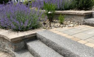 Bahler_brothers_sitting_wall_planted-1