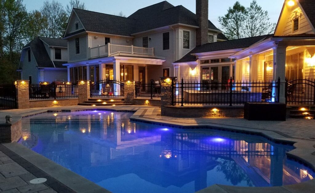 Landscape architectural lighting with pool patio built by Bahler Brothers